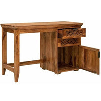 A rustic brown wooden writing desk with a carved drawer, open storage compartment, and open side cabinet door, shown on a plain white background.